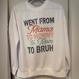 Women’s white sweater. Size L. “Mama to Bruh” saying.